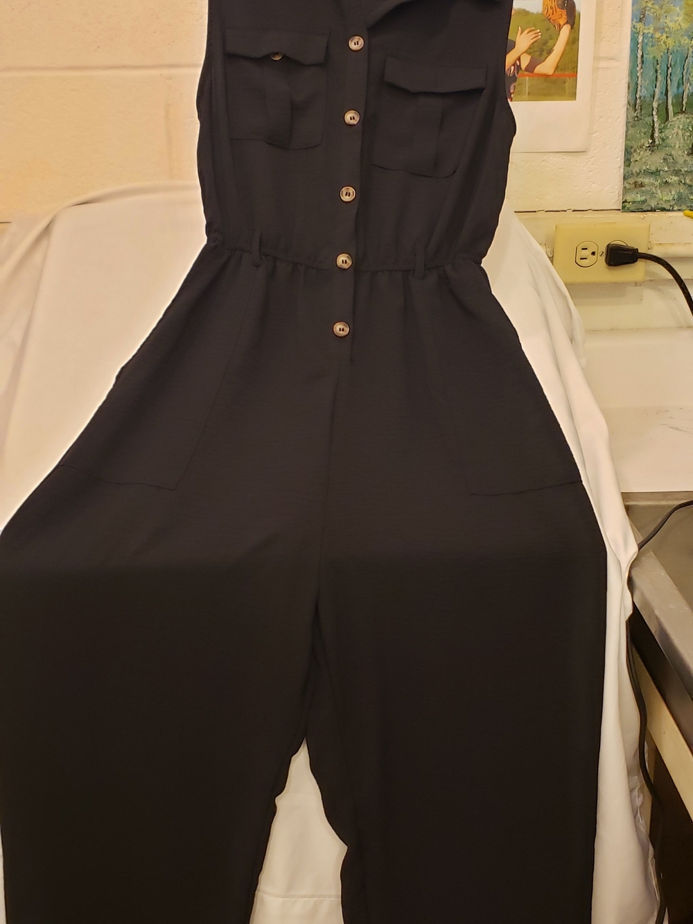 Sleeveless Black Button-Front Utility Jumpsuit
